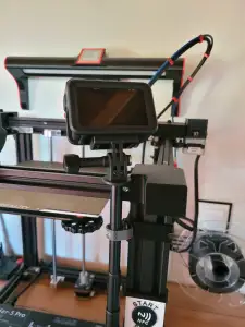 Holder for camera on printer