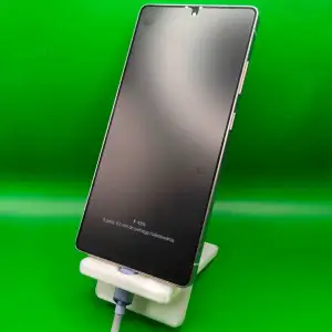 Flat-pack phone stand - charger friendly