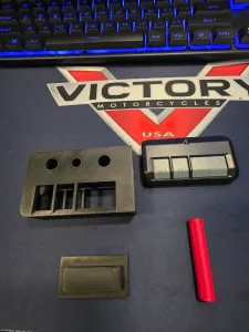garage door remote holder and punch to remove it