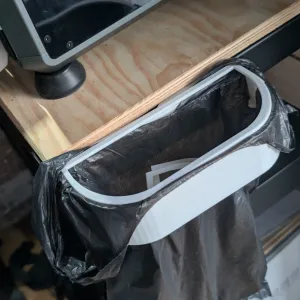 Desk bin bag holder with brim