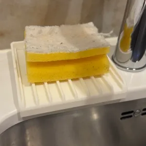 Kitchen sponge holder with drainage for undermount sink