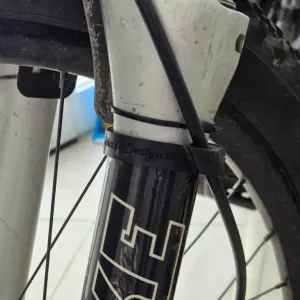 Bicycle front brake hose clamp