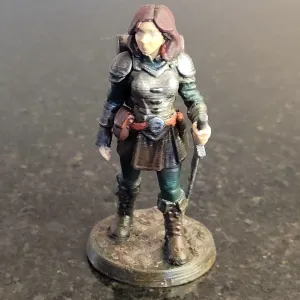 Female model adventurer on round base