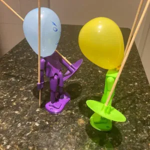 Balloon head puppet fencing fighter