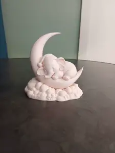 Sleeping Baby Elephant on Crescent Moon
