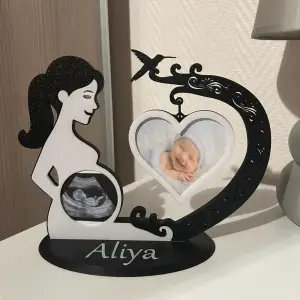 silhouette of pregnant woman with ultrasound and photo of ba
