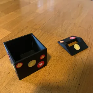 hollow cube box with a roof and a hole