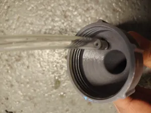 Engine/transmission oil spout