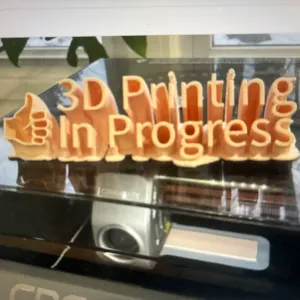 3d printing in progress sign