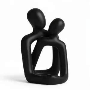 Escultura abstrata de um abraço
