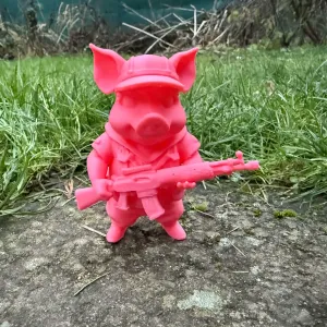 Pig soldier with a gun in his hand