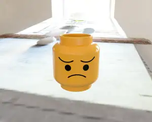 Minifigure Head pencil case with happy and sad faces STD