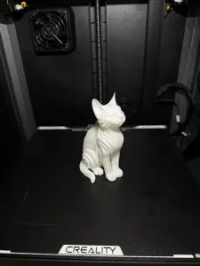 Wave‑Form Cat Figurine