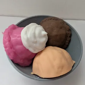 Ice cream in a bowl with whipped cream