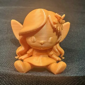 Blossom Sitting Chibi Fairy with Flowers in hair Figurine
