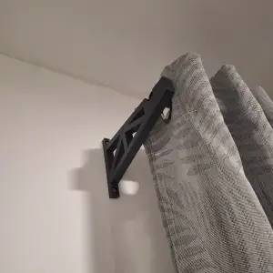 Curtain Holder