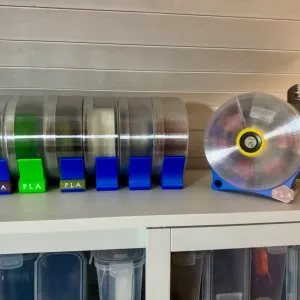 Filament box with ingrated desiccant container