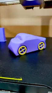 toy small car with rattle ( with poop's )