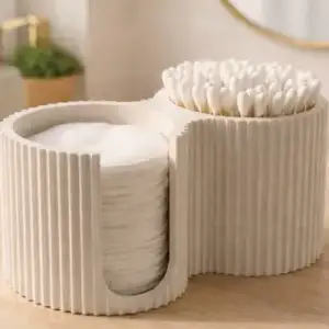 Holder for cotton pads and swabs in the bathroom