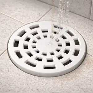 ROTARY DRAIN COVER