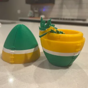 Football storage box with a quarter-turn rotating lock