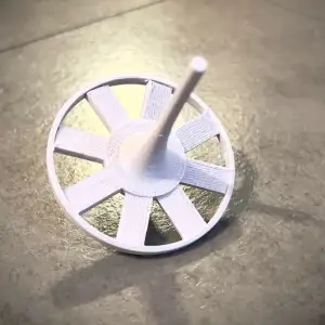 The Fan Spinning Top: Industrial Physics on Your Desk