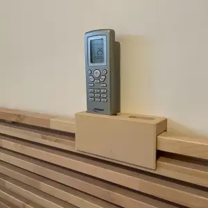 Remote control stand for the IKEA MANDAL bed