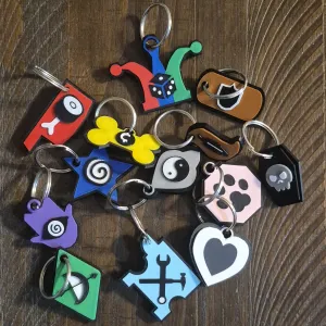 mewgenics class icons keychains with outlines