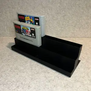 Display stand holder for Super Nintendo SNES games