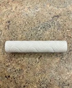 Wavy pattern roller