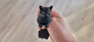 Articulated black cat