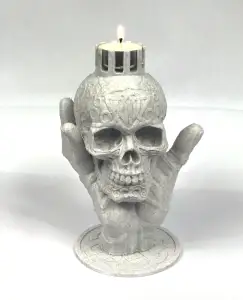 Zombie hand with skull candle holder