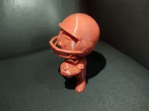 Chibi American Football Player With Helmet And Ball Figurine