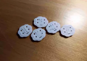 Braille buttons: a pep talk when buttoning your shirt
