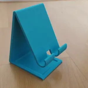 phone holder with charging cable hole