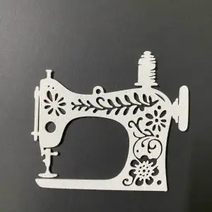 Sewing machine ornament