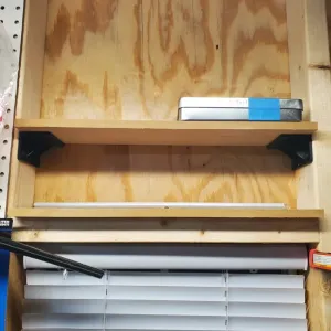 between stud 2x4 shelf bracket (Not my design)