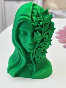 Botanical face sculpture