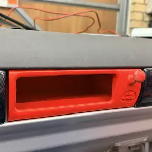 Elise phone holder, replacing the space for a stereo.