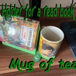 Holder for a read book and a mug of tea