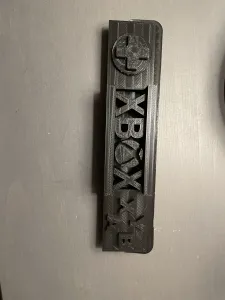 Xbox sign with logo d-pad and buttons
