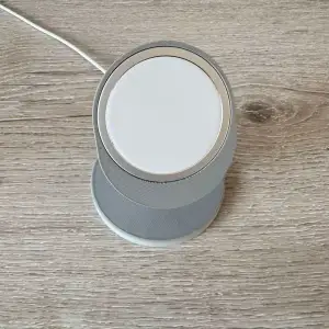 Phone holder with wireless charging support