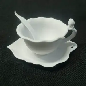 Lily Petal Teacup and Plate with Spoon Figurine