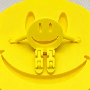 3D-Printed Smiley Face with Articulated Legs Acid House Edi