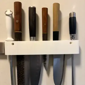 Wall-mounted knife holder