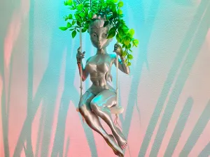 GIRL ON THE SWING PLANTER