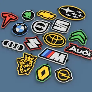 Honeycomb-style keychains with car brand logos. part1