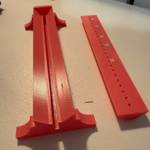 Book binding hole punching tool