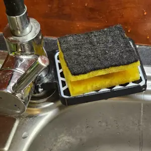 Sponge holder on the faucet