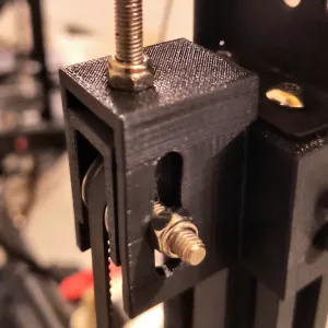 Belted z tensioner